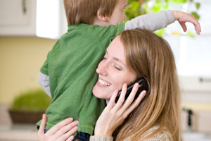 Busy woman with child and phone
